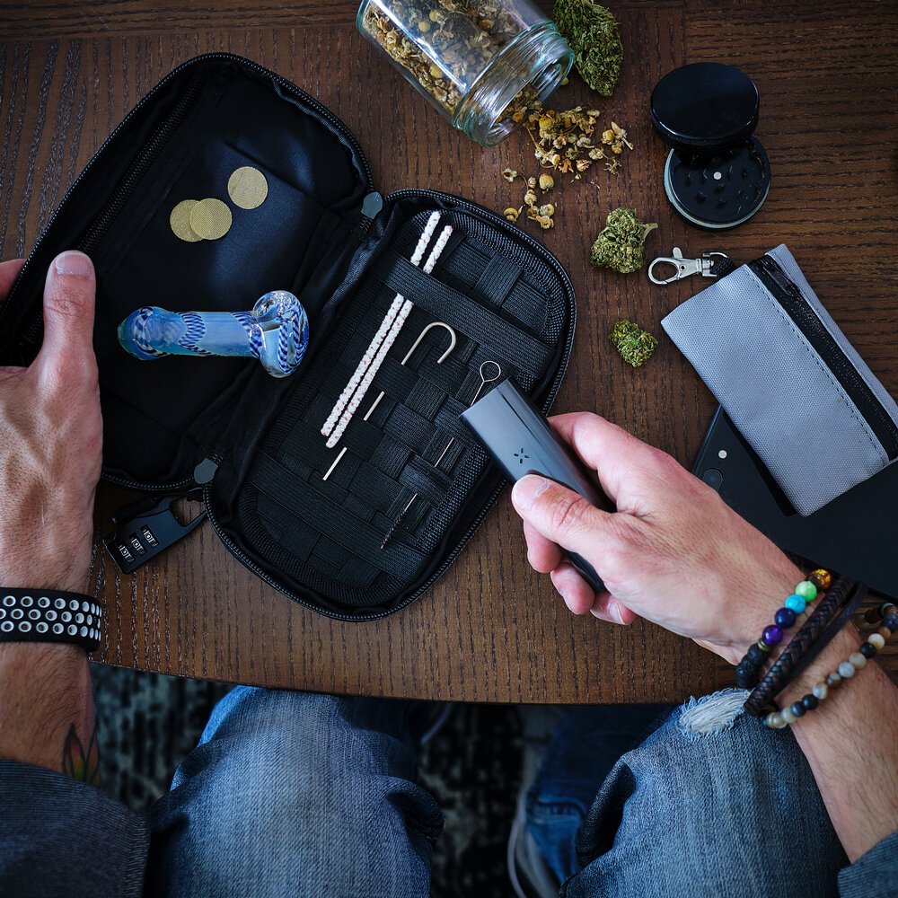 Cannabis for Pain Management. Person Preparing Legalized Marijuana To Smoke Or Vape.